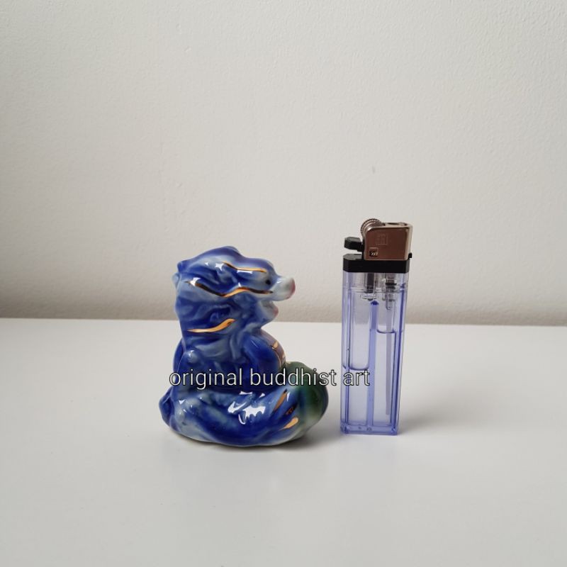 patung shio naga keramik