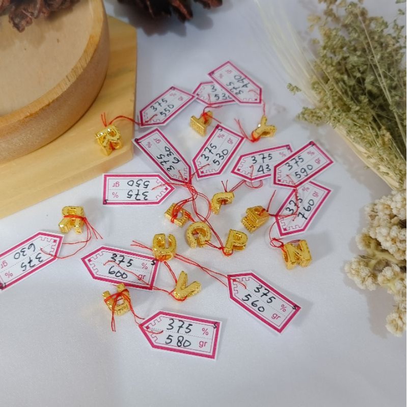 Charm huruf emas asli kadar 375%