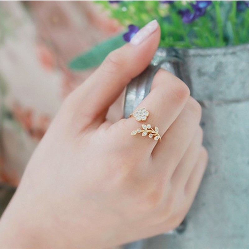 Cincin Korea fashion temperamen berlian memutar daun angan ring pembukaan bunga