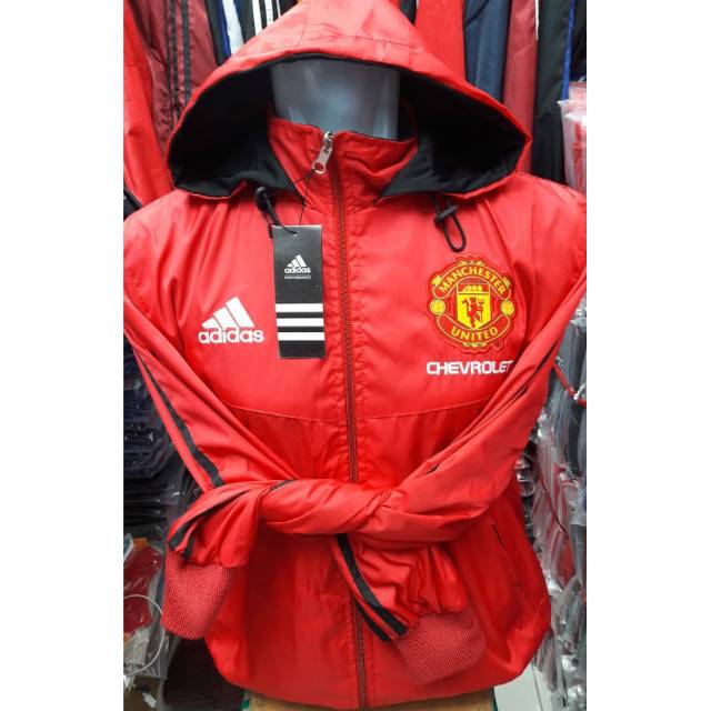 Jaket Bola PARASUT WINDBREAKER WATERPROOF Club Bola MANCHESTER UNITED LIST HITAM