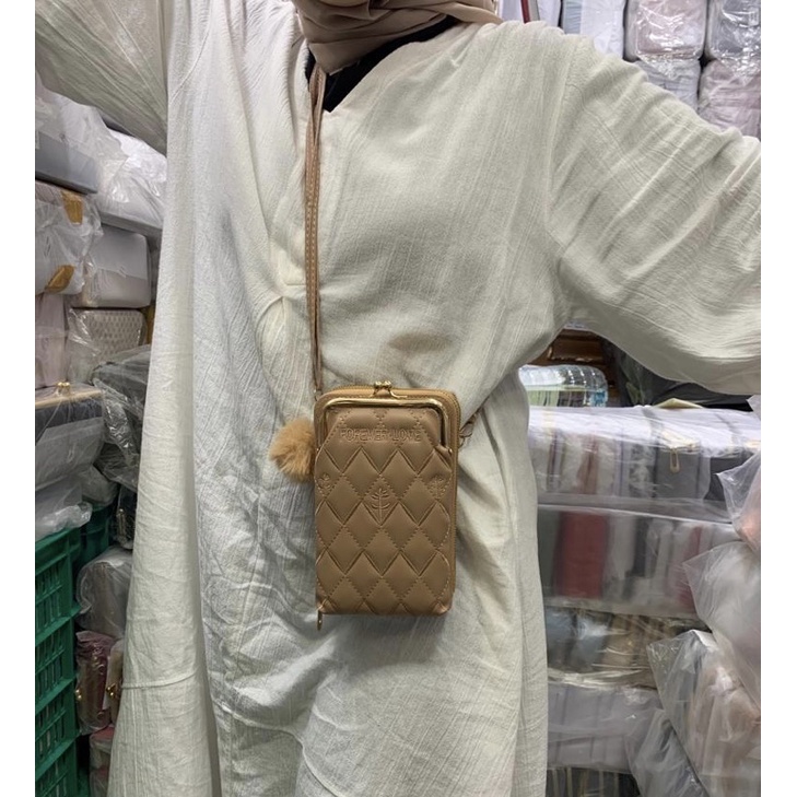 Tas hp behel pompom wanita forever love motif tumbuhan