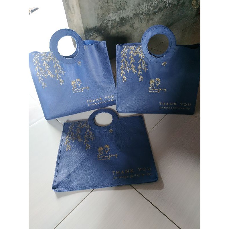 

tas hajatan pegangan bulat