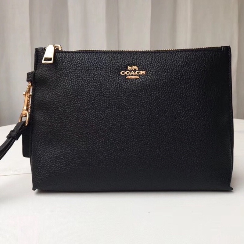 tas coach charlie clutch / pouch wanita