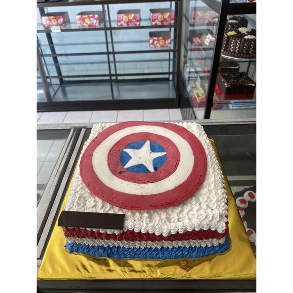 

KUE TART LAPIS SURABAYA GAMBAR CAPTAIN AMERICA UKURAN 22 CM