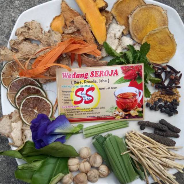 

Wedang Seroja SS Khas Solo 1 pack isi 10 pcs include Gula Batu