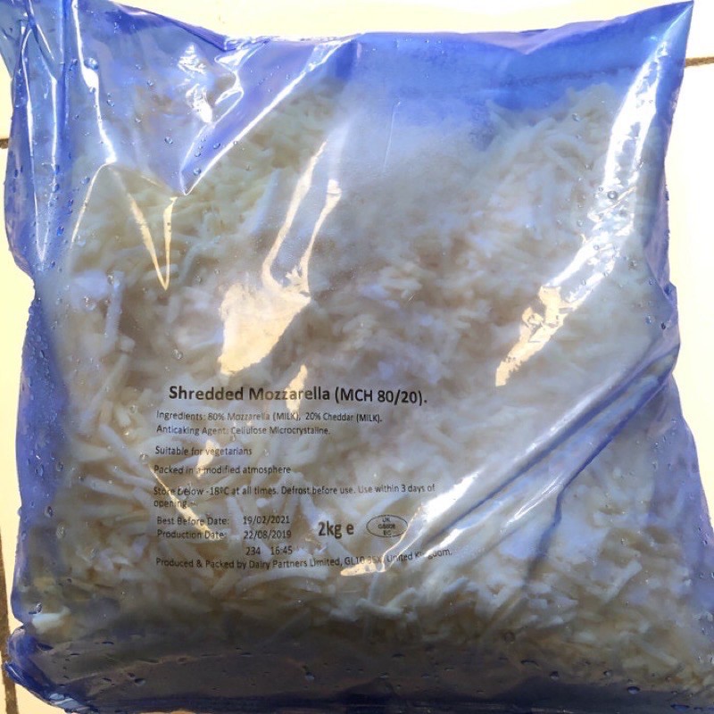 

2 KG DAIRY PARTNER Keju Mozarella Parut / Keju Mozarella / Mozarella Vegetarian