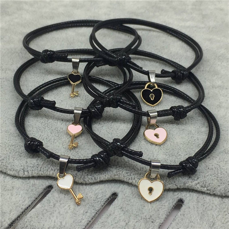 2pcs / Set Gelang Tali Warna Hitam Desain Kunci Gembok Untuk Pasangan