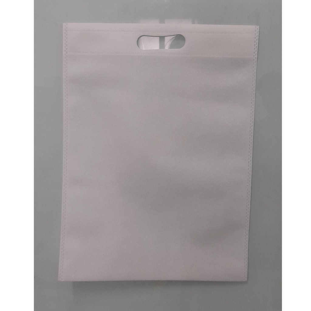 

Tas Press Spunbound Oval Goodie Bag Tas Belanja Warna Putih 30 cm x 40 cm