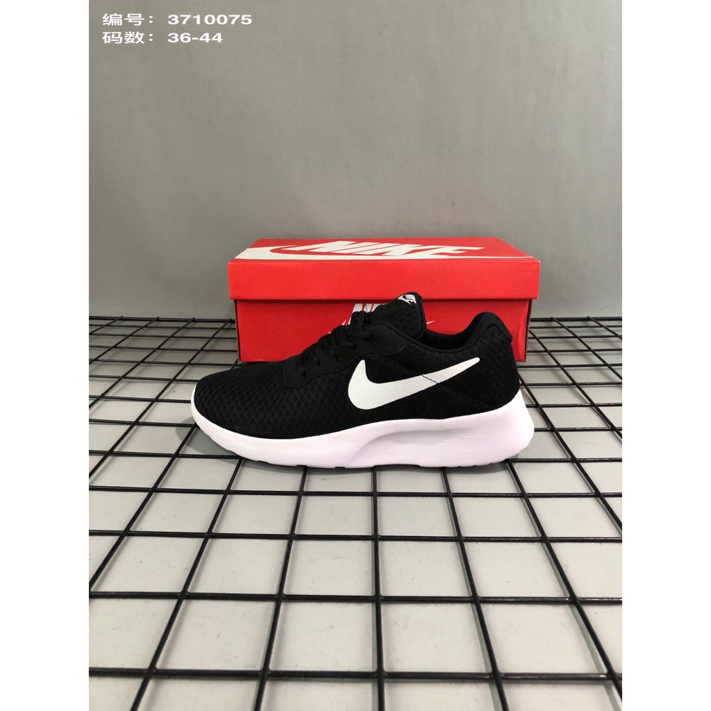 nike tanjun premium trainers ladies