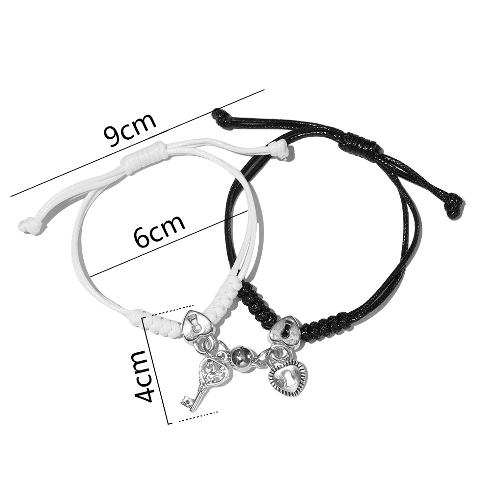 2pcs Gelang Tangan Magnetik Gaya Korea Warna Hitam / Putih Untuk Pasangan / Pria / Wanita