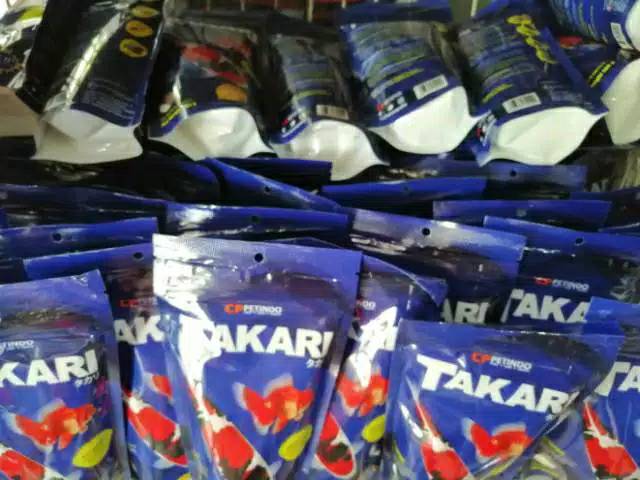 Makanan ikan TAKARI 100GR SATU DUS 60PC