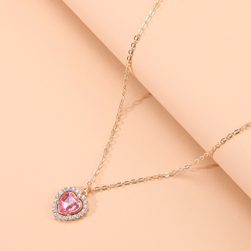 Kalung Rantai Liontin Hati Hias Kristal Zircon Imitasi Bahan Alloy Warna Pink Untuk Wanita