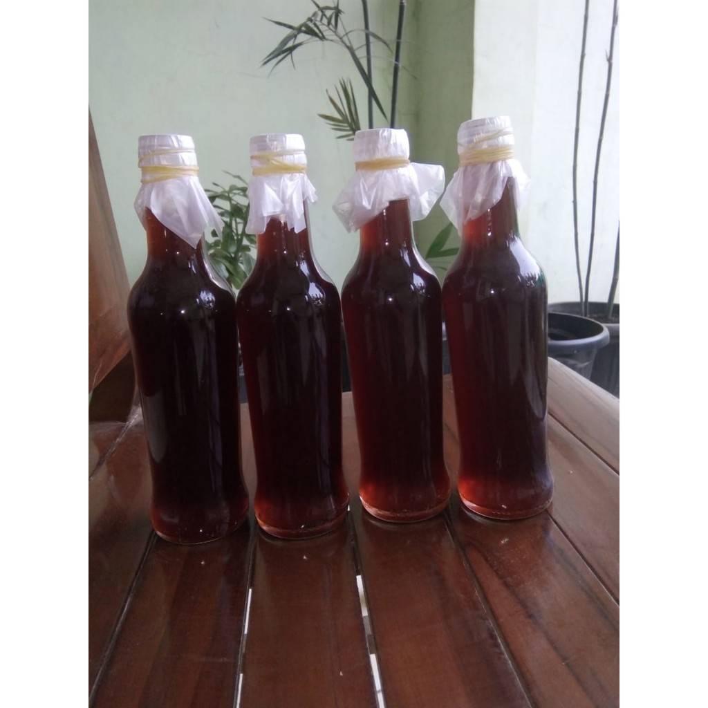 

Madu sialang hitam/pahit
