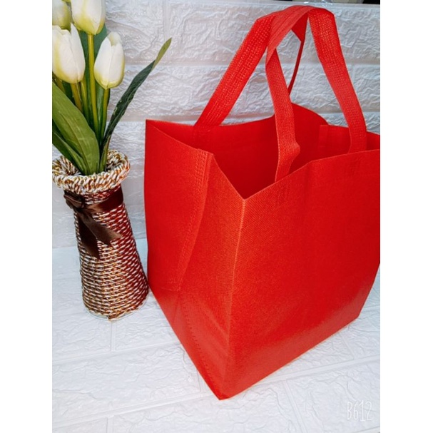 

tas spond untuk nasi kotak 22x22cm lusinan