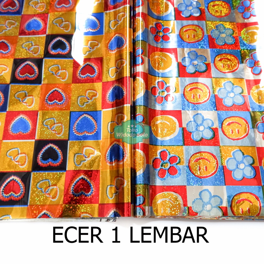 

Plastik Kado Hologram Fancy Emoticon Heart Sun Shine 50x70cm - 1 Lembar