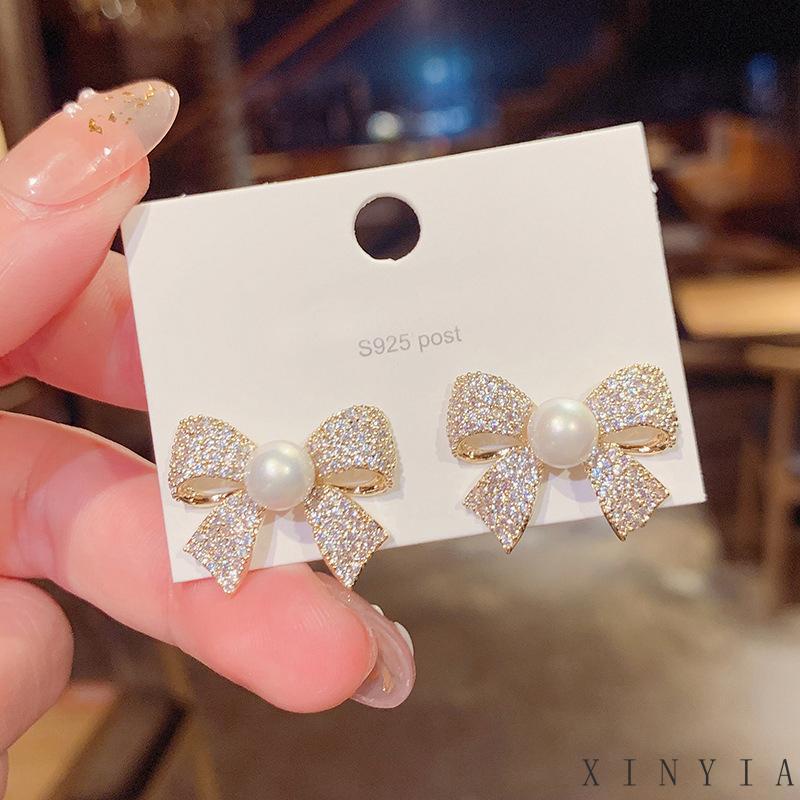 Xia.id Anting Tusuk Gantung Desain Pita Hias Mutiara Gaya Trendy / Simple Untuk Wanita