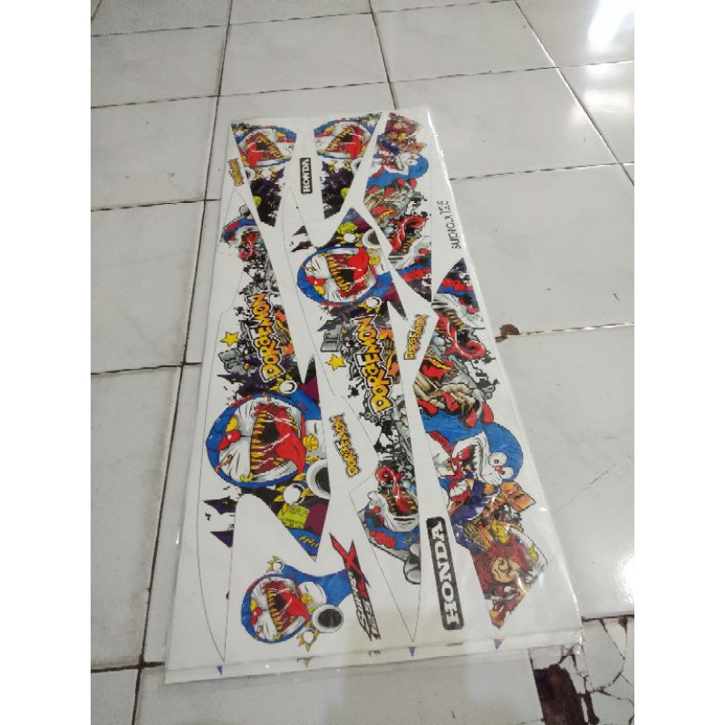 Striping variasi supra x 125 doraemon