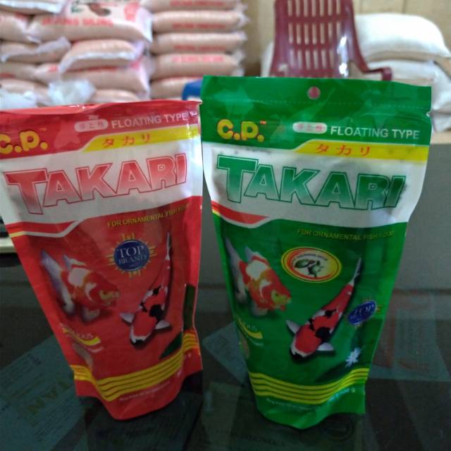 TAKARI 100gr 100 gr FISH FOOD MAKANAN IKAN WARNA MERAH DAN HIJAU