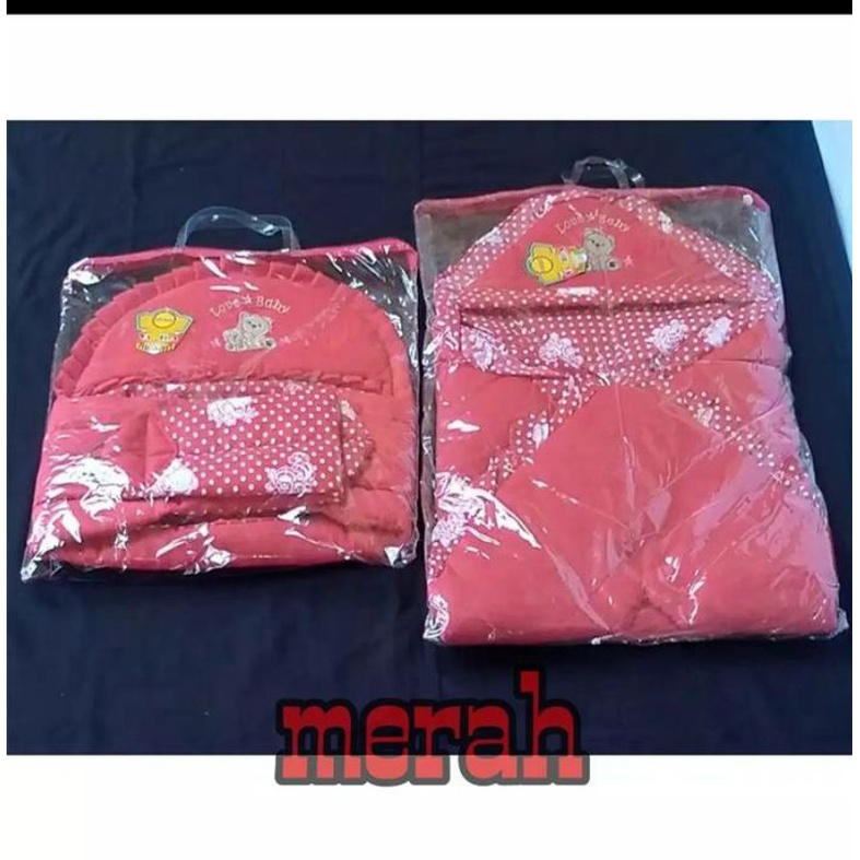 Gendongan bayi dan selimut