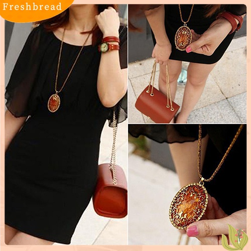 [TERLARIS]Women's Vintage Amber Tone Hollow Long Chain Drop Pendant Sweater Necklace