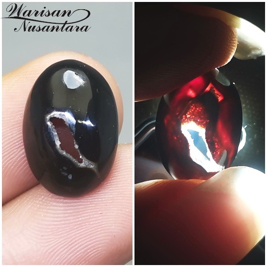 Permata Batu Combong Wulung Hitam tembus Merah Oval Asli