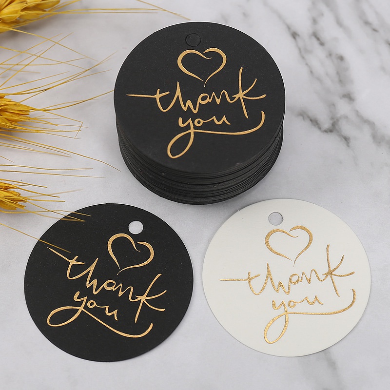 100pcs / Set Kartu Tag Gantung Bentuk Bulat Tulisan Thank You Warna Hitam / Putih Untuk Dekorasi Kemasan Kue