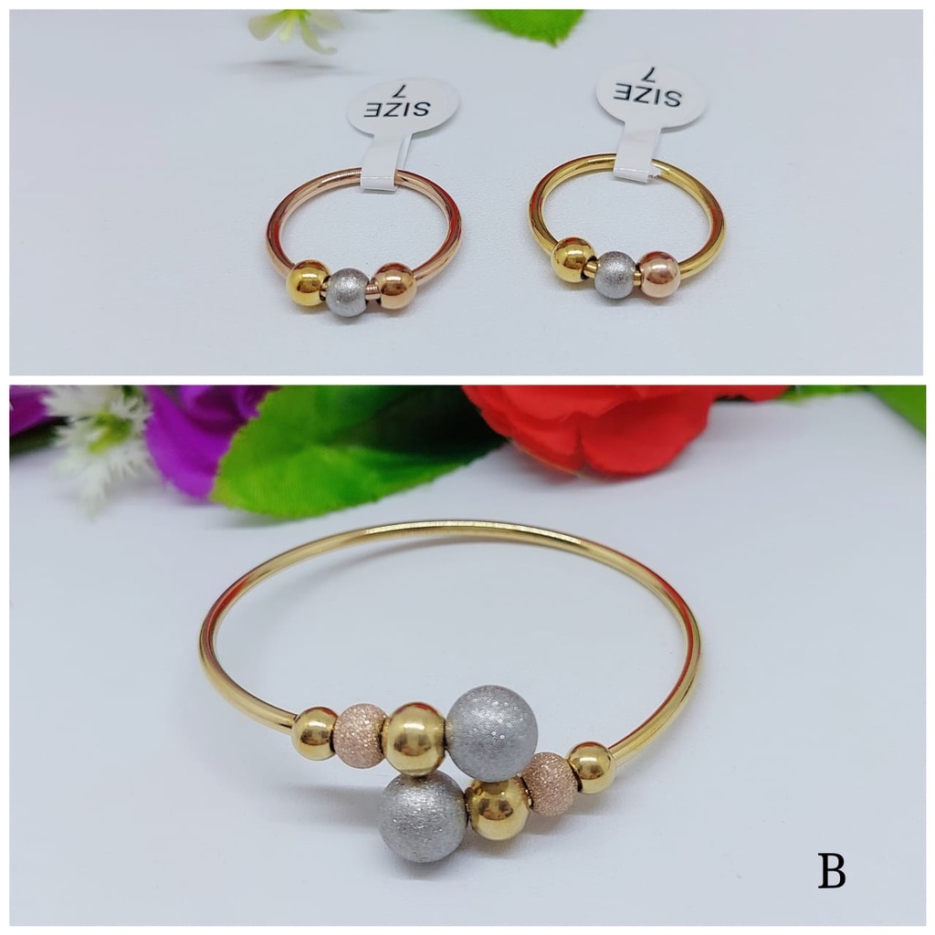 Titanium gelang dan cincin biji bola A.B