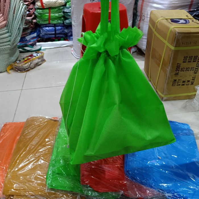 

✨ BISA COD ✨ tas kain spunbond serut 30 batik isi 12 pcs terlaris