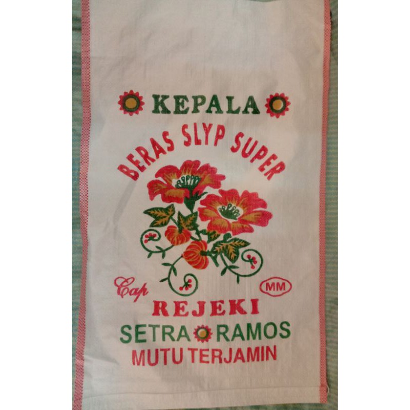 

karung beras rejeki polos/putih susu 25 kg(ini kemasan bukan beras )
