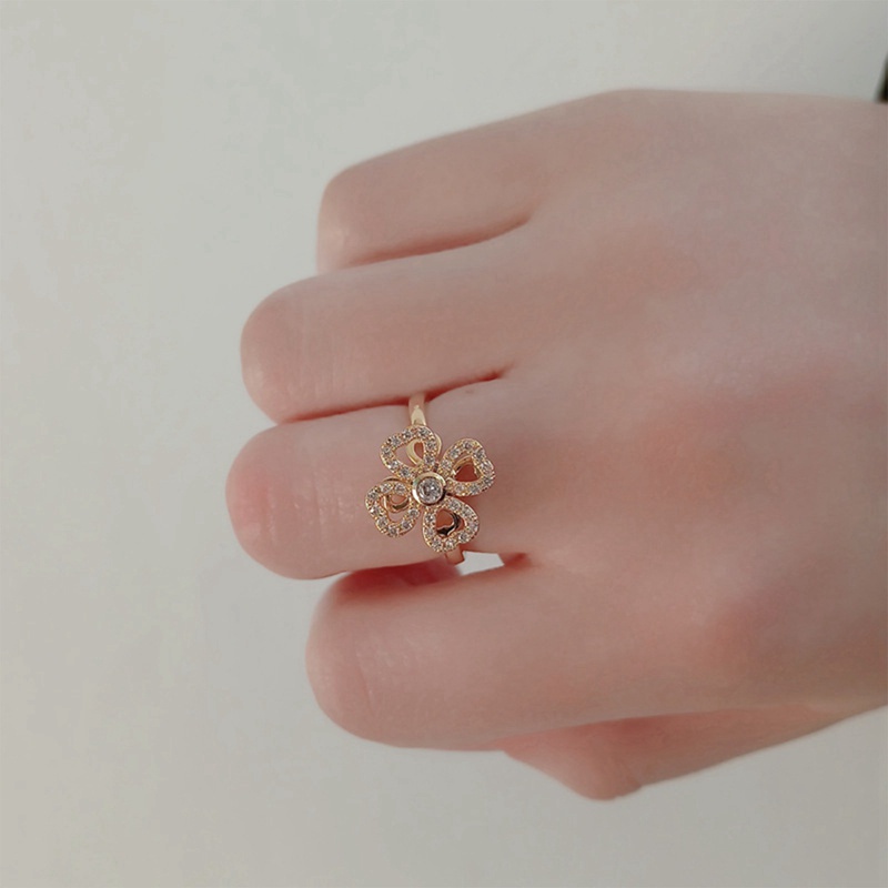 Fancyqube Cincin Desain Daun Semanggi Kincir Angin Bahan Zirkon Dapat Diputar Untuk Wanita