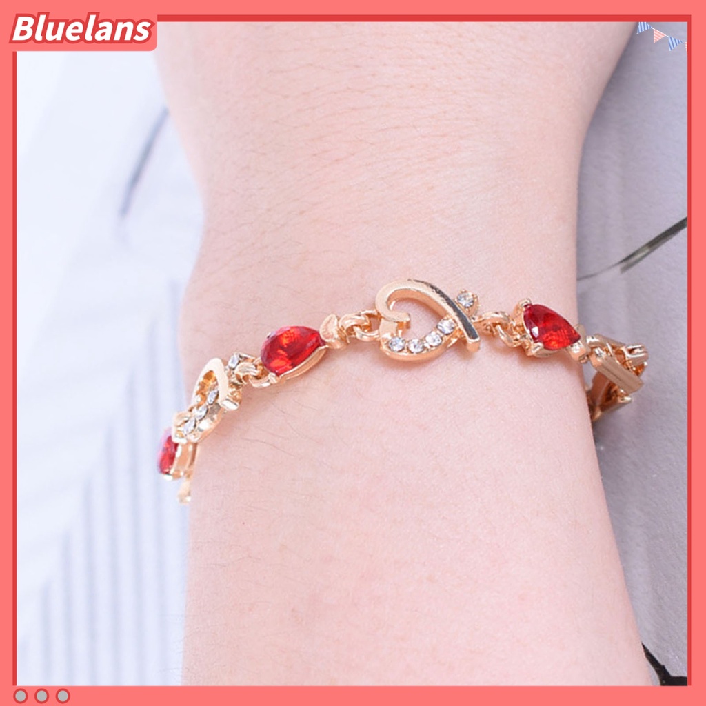 Gelang Rantai Desain Hati Hollow Aksen Berlian Imitasi Warna Merah Bahan Alloy Untuk Wanita