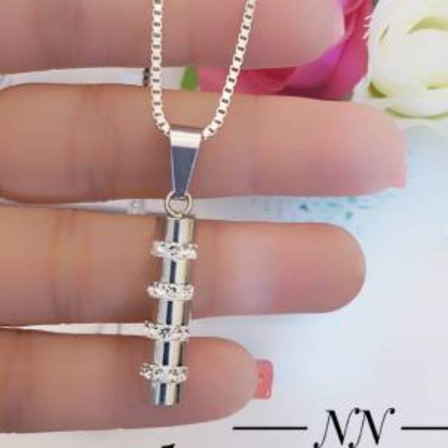 Kalung gelang cincin anting titanium terlaris