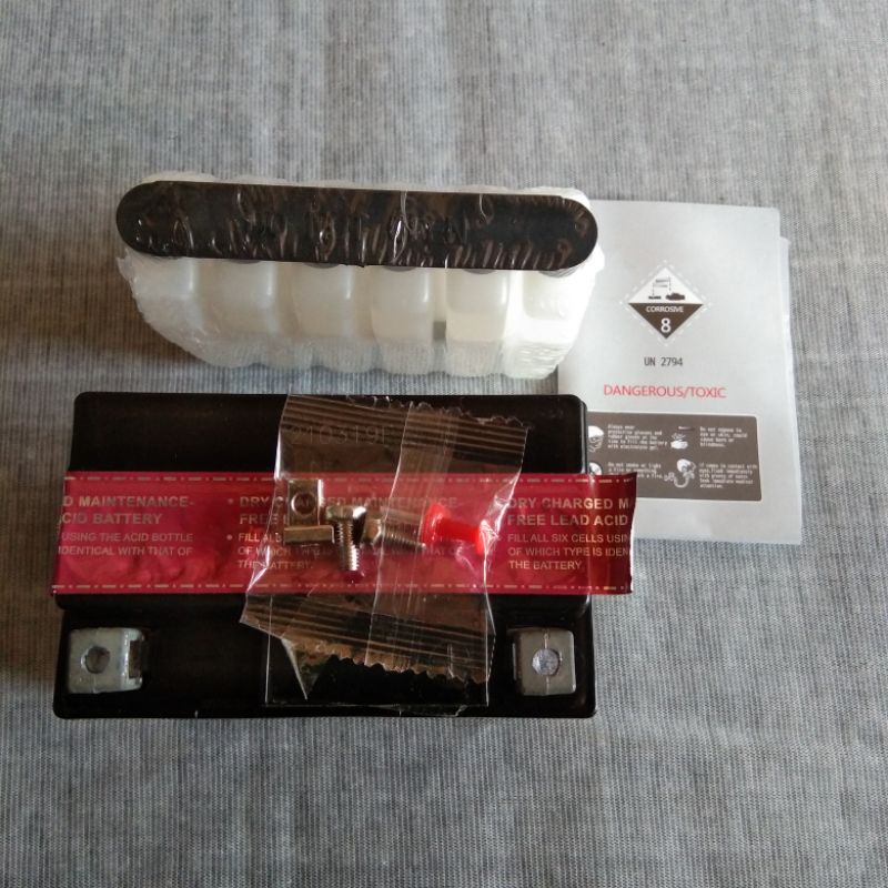 aki kering merk voddoo di pasang buat motor beat dan vario. scopi