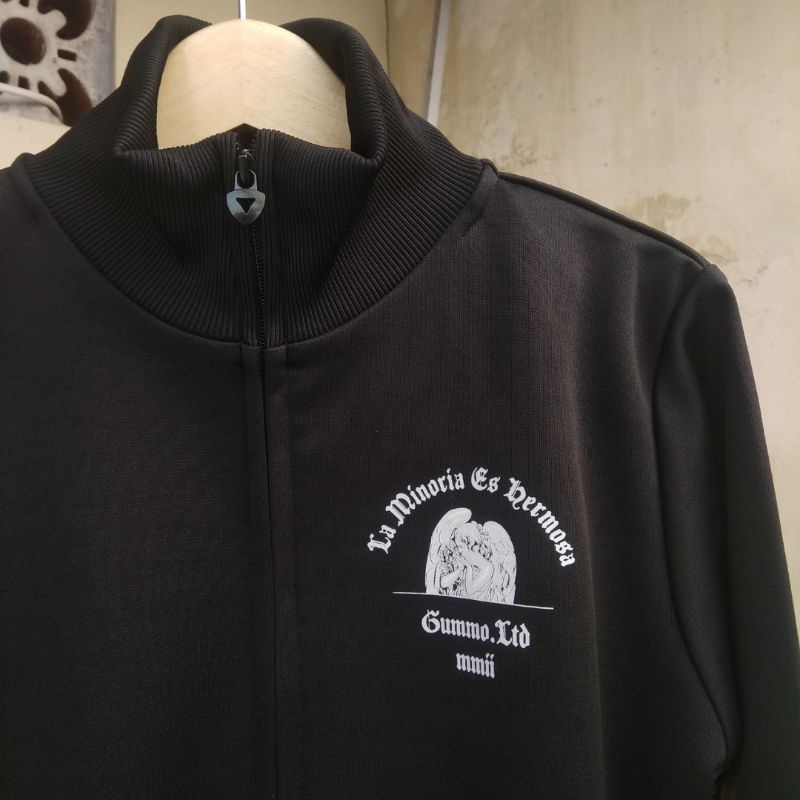 JAKET TRACKTOP POLYSTER DISTRO GUMMO OUVAL RSCH