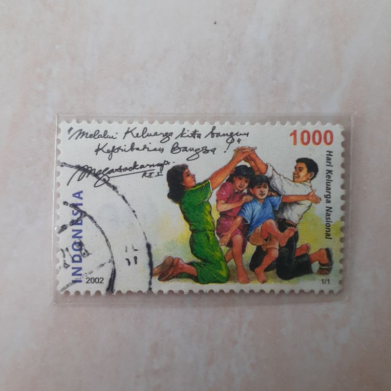 

Perangko Indonesia Hari Keluarga Nasional Tahun 2002 - 1pcs