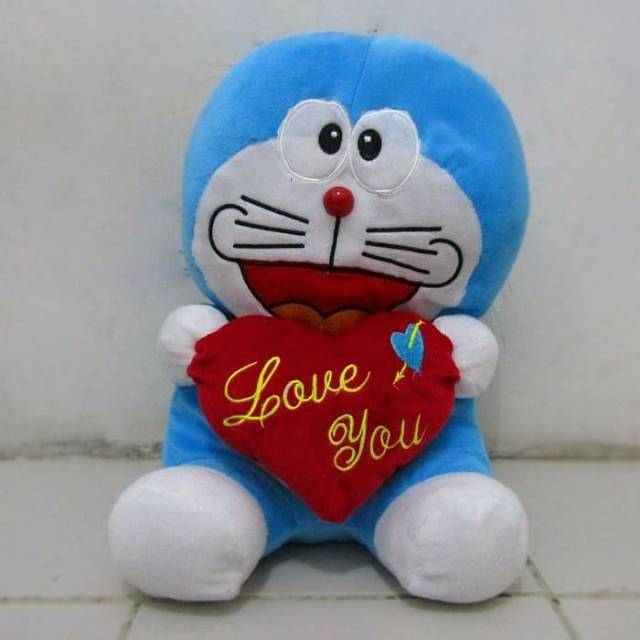 Boneka doraemon SNI love size:XL