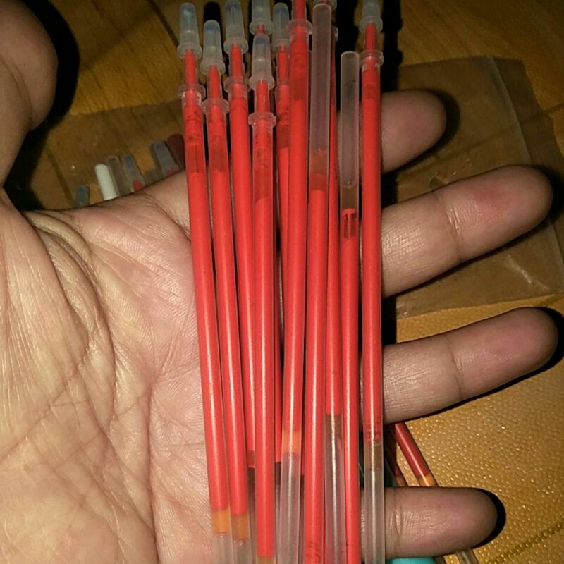 

isi pena tinta merah