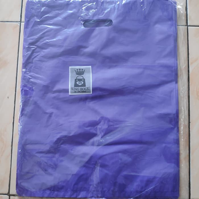 HD oval Polos 35x45, kantong plastik baju, plastik packing baju