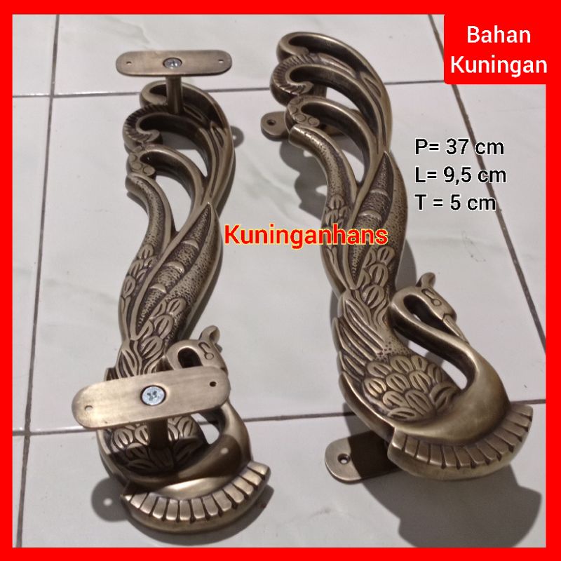 gagang pintu rumah mewah motif merak antik kuningan