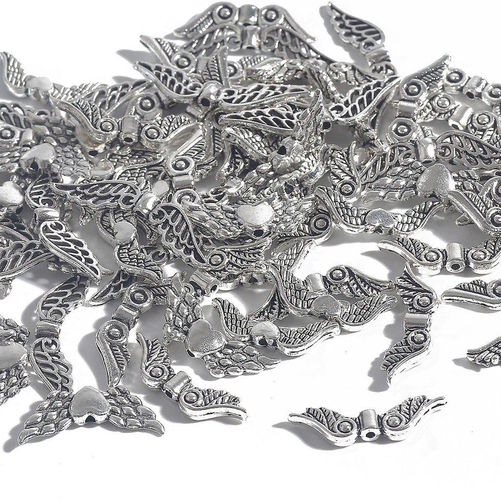 20 Pcs / Lot Liontin Manik-Manik Bentuk Sayap Malaikat Warna Silver Bahan Alloy Gaya Vintage Antik Handmade