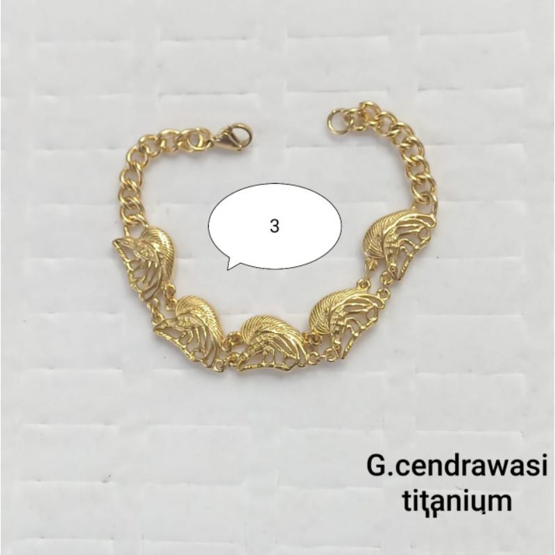 GELANG TANGAN TITANIUM MOTIF CENDRAWASIH WARNA EMAS