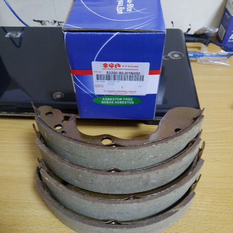 kampas rem belakang x-over