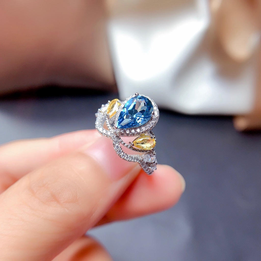 Cincin Model Terbuka Desain Mahkota Hias Topaz Biru Gaya Simple Untuk Wanita