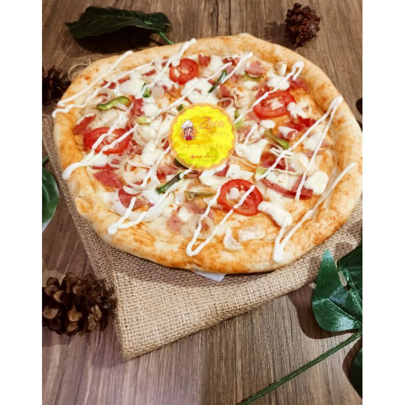 

pizza besar/ promo beli 1 gratis 1