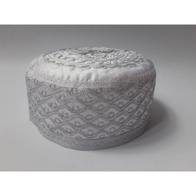 Peci dewasa al zahra