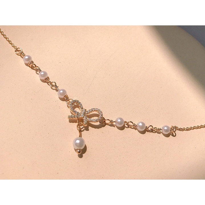 HBS 041 Gelang Mutiara Cinta Berbentuk Pita Gelang Wanita Keren  041 - GL