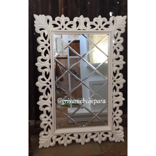 cermin hias dinding ukir kaca bevel jepara