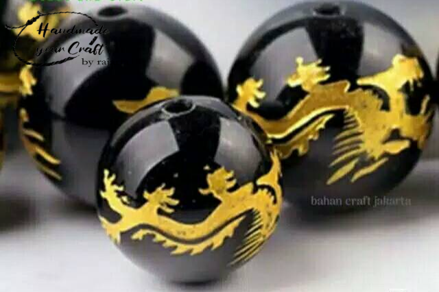 Butir Batu Black Onyx Tibetan Dragon Carved Stone