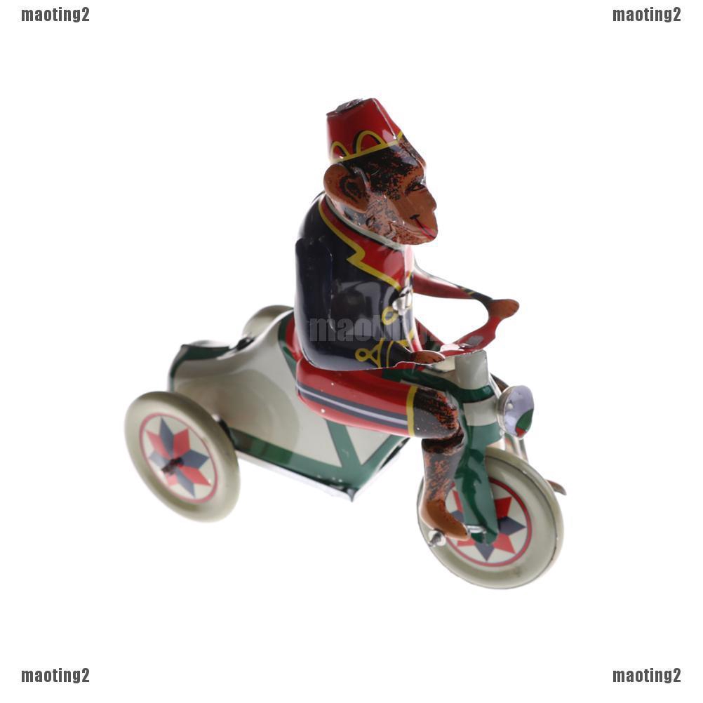 Mainan Bentuk Monyet Naik Sepeda Model Putar Clockwork Bahan