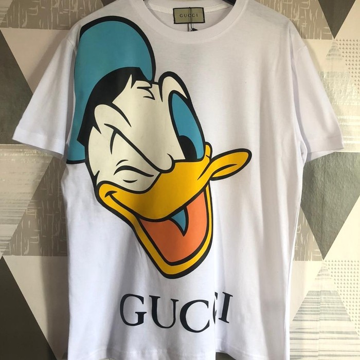 T-SHIRT GUCCI X DONALD WHITE PREMIUM KAOS PRIA GUCCI KAOS WANITA GUCCI